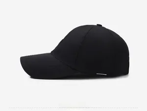 Side view of a minimalist black baseball cap showing sleek profile and breathable fabric