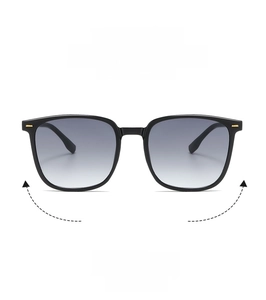 Detail of square vintage sunglasses with black frames and grey gradient lenses