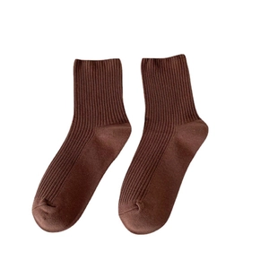Deep brown ribbed knit crew socks for women made of soft cotton with a minimalist design