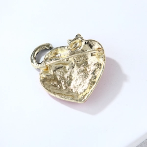 Back view of gold heart cat brooch with secure rotating safety clasp and pin detail
