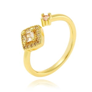 Detail of 18K gold plated open ring featuring square clear and pink crystal accents