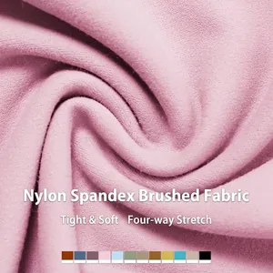 Pink high-stretch nylon spandex yoga sports bra with soft brushed fabric texture