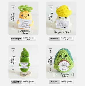 Detailed view of handmade crochet dolls with motivational cards in four cute designs