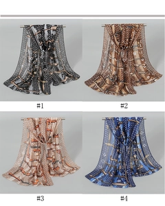Detail showing four lightweight chiffon scarves with vintage clover and chain prints