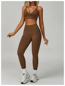 Brown seamless high-waist yoga leggings and V-neck sports bra set with matte finish