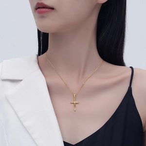 Luxurious gold cross pendant necklace for women featuring shimmering zircon stones