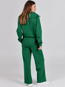 Rear view of green wide-leg lounge set showing high-quality fabric texture and fit