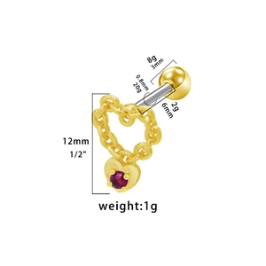 Dettaglio dell'orecchino a cuore dorato con zircone rosa e specifiche di misura