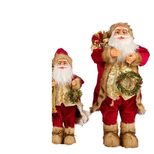 Poupées de Père Noël créatives en rouge et or pour la décoration festive de Noël à la maison