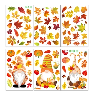 Set of 6 autumn gnome window clings featuring maple leaves, pumpkins and acorns