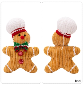 Front and back detail of a knitted gingerbread man ornament with chef hat and bow