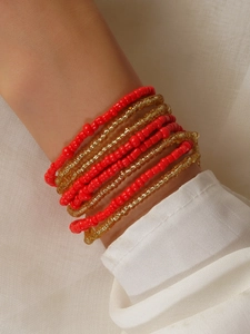 Close-up of bohemian multi-layer colorful bead waist chain and summer beach body jewelry