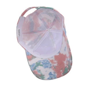 Tie-dye cotton baseball cap with pink and blue patterns showing internal structure