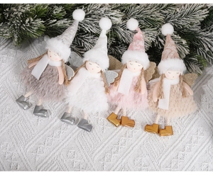 Detailed group view of plush Christmas angel dolls in four soft colors with knit hats