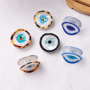 Set of mini Evil Eye hair claws in various acetate patterns with tortoise shell finish