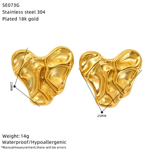 Detail view of 18k gold plated stainless steel lava heart earrings with size measurements