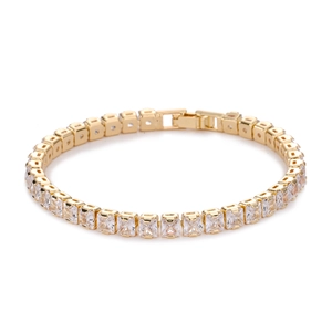 Detailed view of gold-plated tennis bracelet featuring square-cut AAA cubic zirconia stones