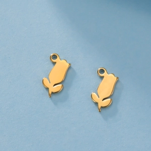 Detail shot of a pair of golden tulip pendants made of polished 304 stainless steel