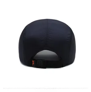 Detail of navy quick-dry baseball cap featuring breathable fabric and adjustable strap buckle