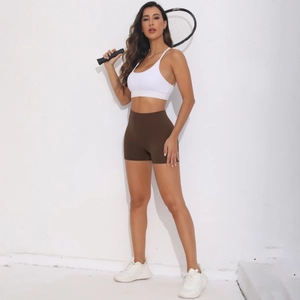 Close-up of high-waist scrunch shorts and sports bra set for yoga and fitness