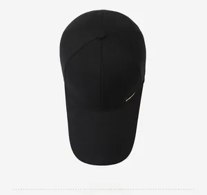 Top view of a black cotton baseball cap with gold embroidery for men's outdoor style