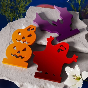Halloween DIY resin mold set with pumpkin, bat and ghost shapes on white rock base