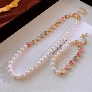 Luxury pearl necklace and bracelet set with colorful round gemstones and gold plating