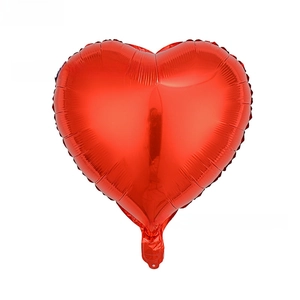 Detail of 18 inch heart shaped red foil balloon showing glossy metallic surface and texture