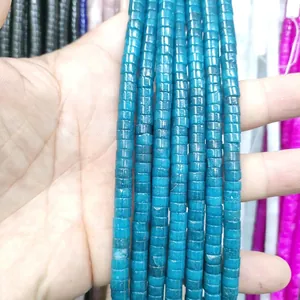 Macro shot of 3x6mm cylindrical blue tiger eye stone beads for jewelry making