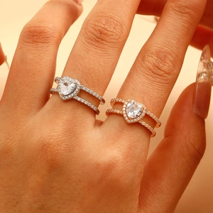 Exquisite heart shaped diamond rings in silver and gold with double row pave band