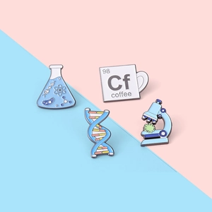 Science enamel pin set with microscope, DNA, flask, and coffee mug on pastel background