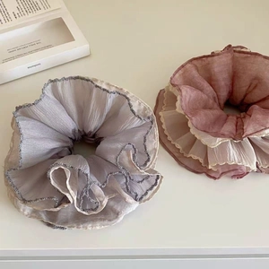 Elegant multi-layered chiffon scrunchies in dusty rose and grey-purple with lace edges