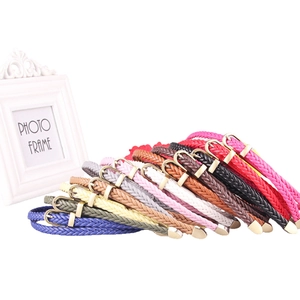 Handwoven thin leather belts for women in twelve bright colors with gold buckles