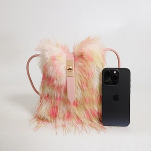 Chic pink and yellow gradient faux fur crossbody bag with pink leather strap and gold clasp