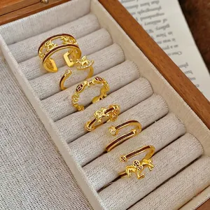 Gold-plated adjustable pony rings set with enamel and zircon in a luxury wood box
