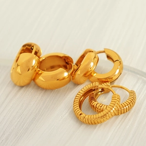 Classic minimalist gold titanium steel hoop earrings with smooth and textured finish