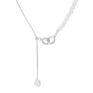 Detail of silver snake chain and pearls with intertwined rings and a zircon accent