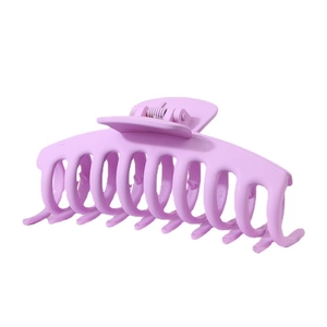 Detail view of large matte light purple hair claw clip with strong metal spring
