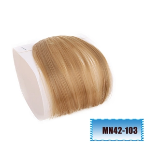 Macro shot of honey blonde synthetic fringe clip-in extension with natural fiber texture