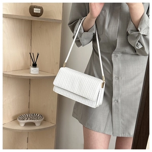 Minimalist white woven leather shoulder bag for women with golden metal hardware