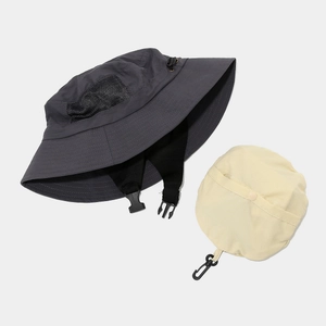 Foldable dark gray sun hat with breathable mesh and beige storage pouch for outdoors