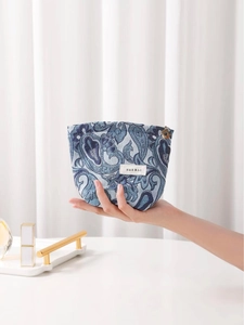 Blue paisley floral makeup bag with elegant jacquard fabric and H&R BAG logo label