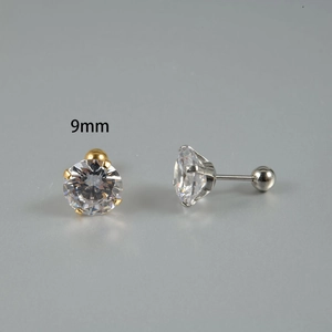 Macro detail of a 9mm round cubic zirconia stud earring with a secure four-prong setting