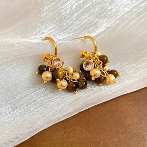 Tiger eye stone and crystal tassel drop earrings in vintage gold-tone metal finish