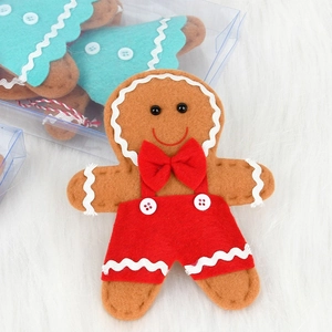 Felt gingerbread man ornament with red bow tie and overalls for Christmas tree decor