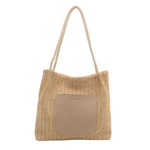 Beige woven bucket tote bag with leather patch and slim shoulder straps for summer