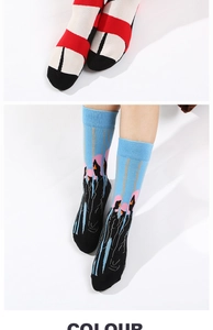 Detail of cotton crew socks featuring Picasso-inspired abstract and sandal patterns