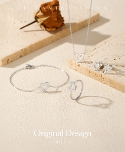 Elegant S925 sterling silver jewelry set featuring heart designs on stone textures