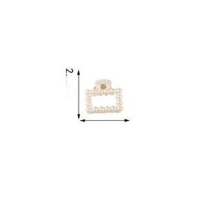 Detail view of rectangular pearl hair claw clip showing dimensions 2.7cm by 2.5cm