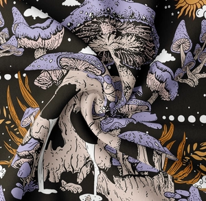 Detailed view of bohemian mushroom tapestry with intricate celestial patterns and soft fabric texture